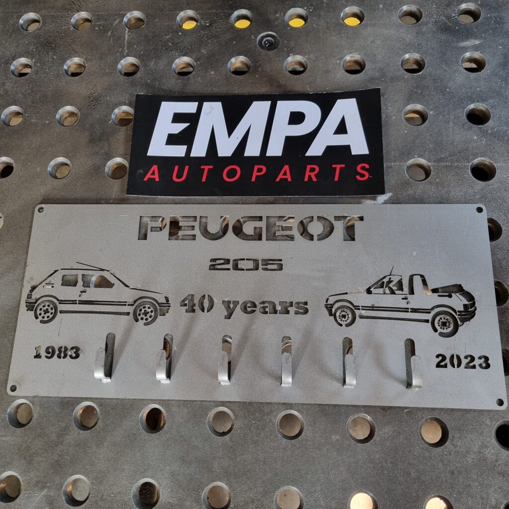 peugeot 205 40 year key sign – Empa autoparts